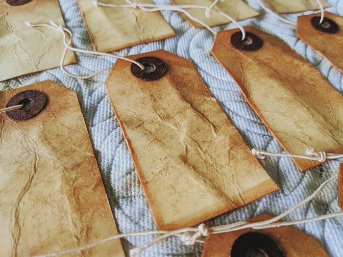 Letting the tags dry on paper towels, on cookie sheets<br>

